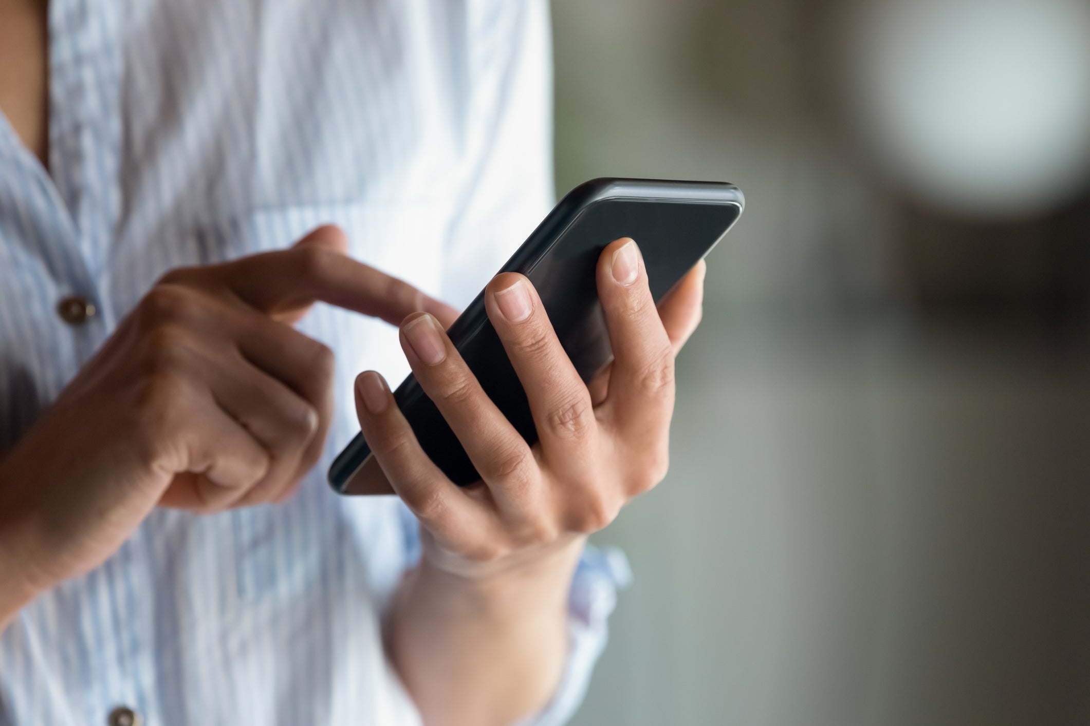 Person holding phone