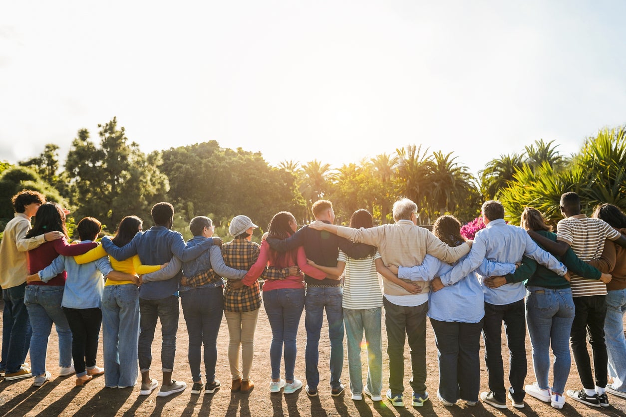 Group hugging not facing camera