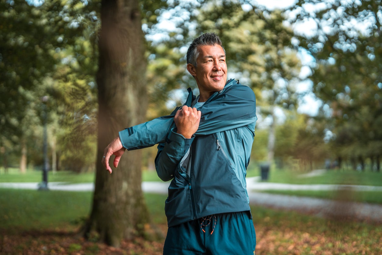 Man stretching outside